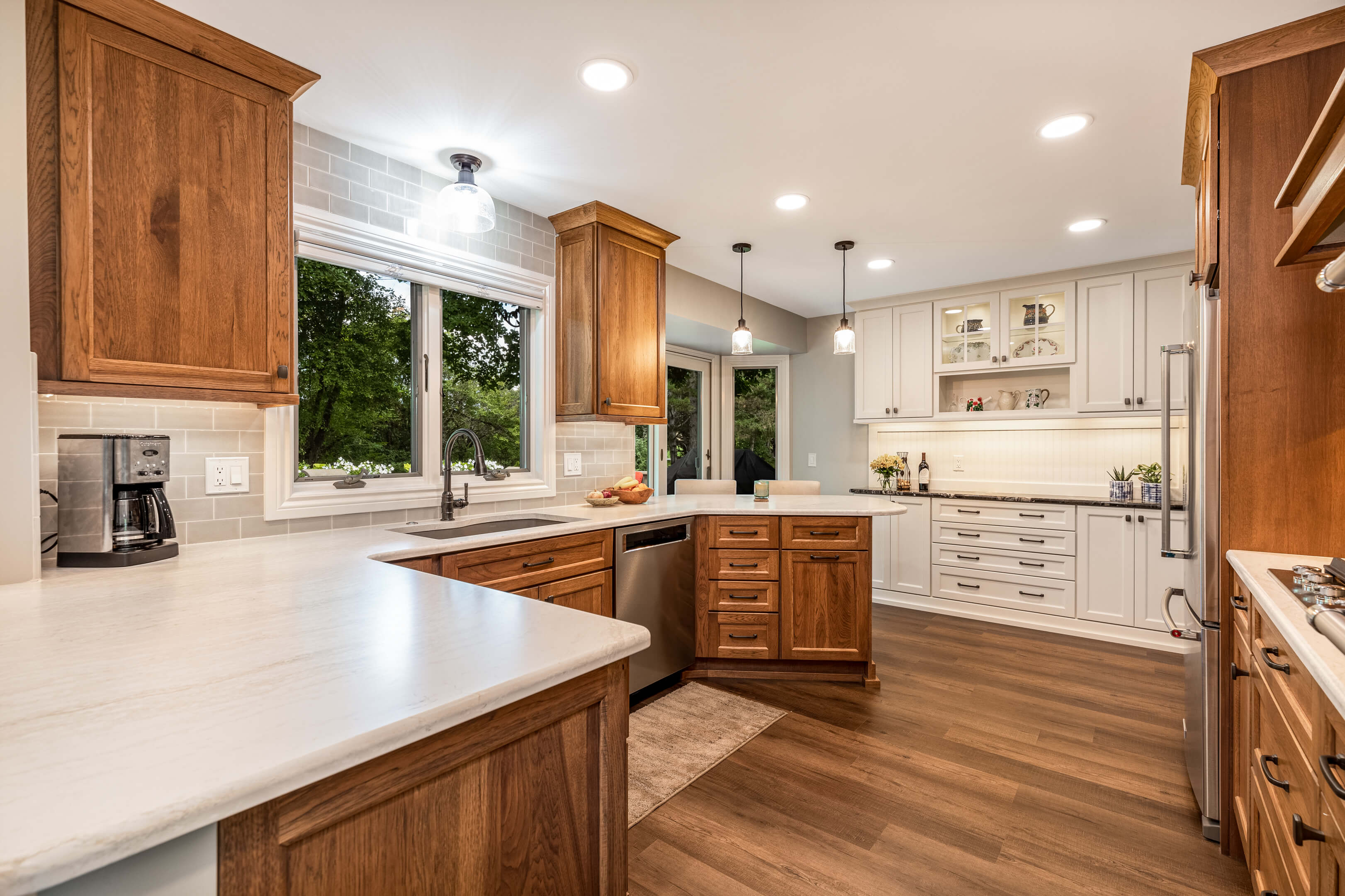 Convenient home Coffee Station with dark-stained cherry cabinetry